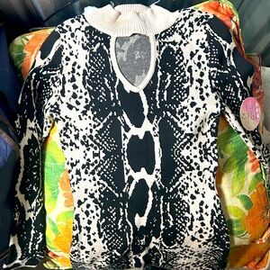 Black and cream long sleeve dress with snake pattern